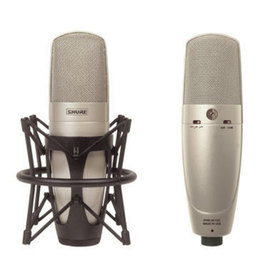 Two views of the KSM32 Microphone showing it in a shock mount and rear control switches