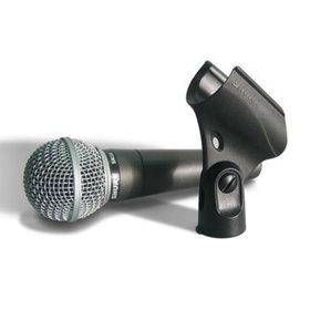 SM58 Microphone beside microphone stand