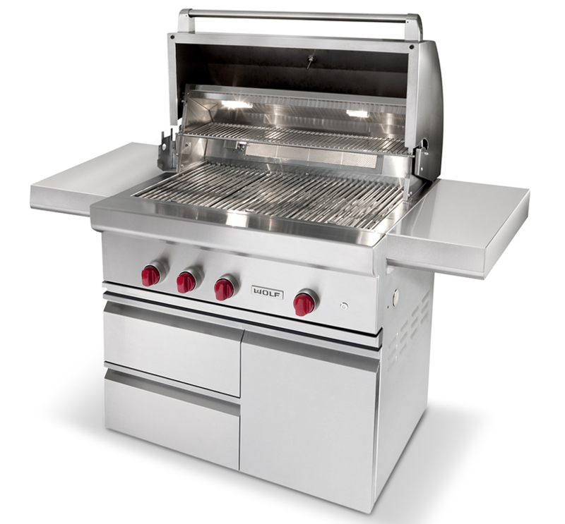 Three quarters front view of the 30 inch gas grill with hatch open and side tables extended