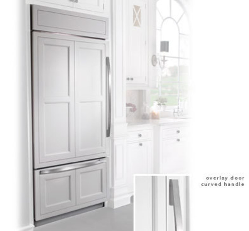 Built in refrigerator with a framed cabinet style overlay