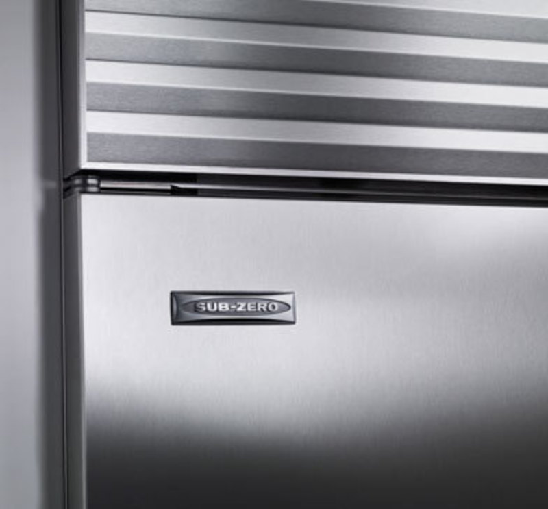 Detail view of the stainless steel finish and the Sub-Zero logo