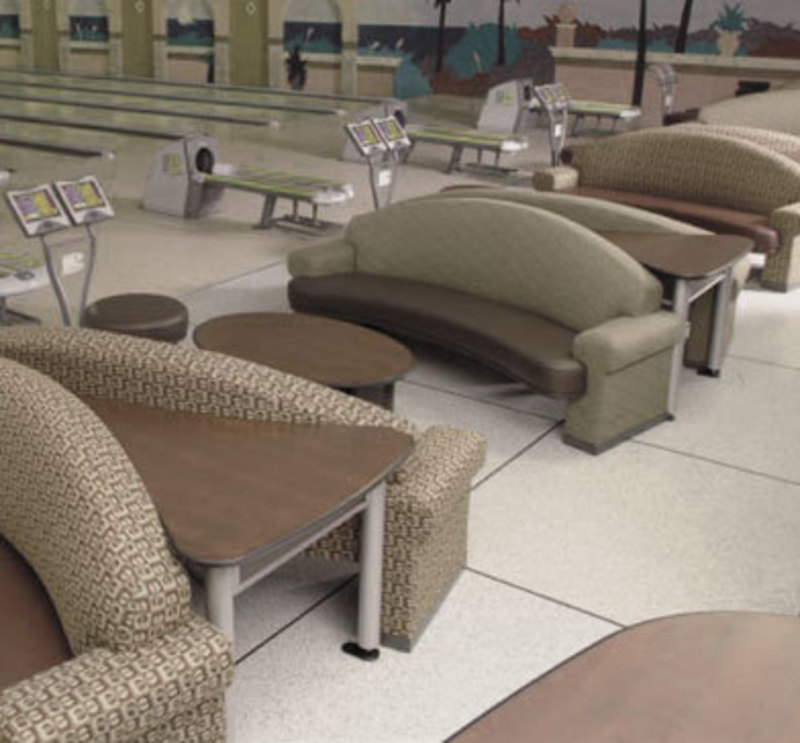 In context photograph showing the striking line couch installed in a bowling alley