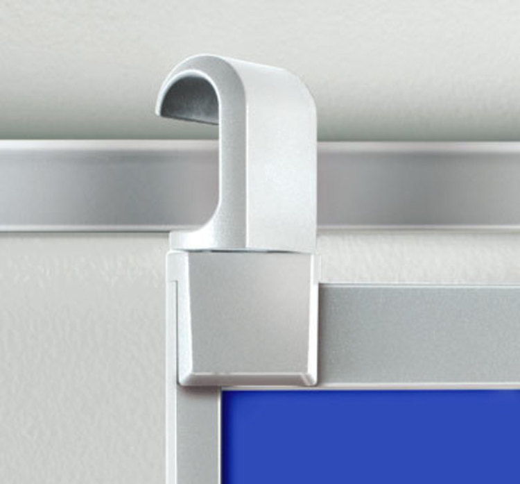 Detail view showing the hooks used by the Get Set presentation board system interact with the wall rails