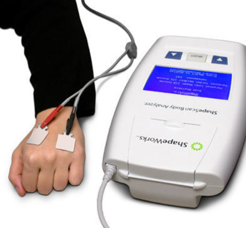 Image showing a person using the ShapeScan with adhesive contacts applied to the back of their hand