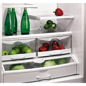 Three quarters front view of the production version showing produce and water in the refrigerator