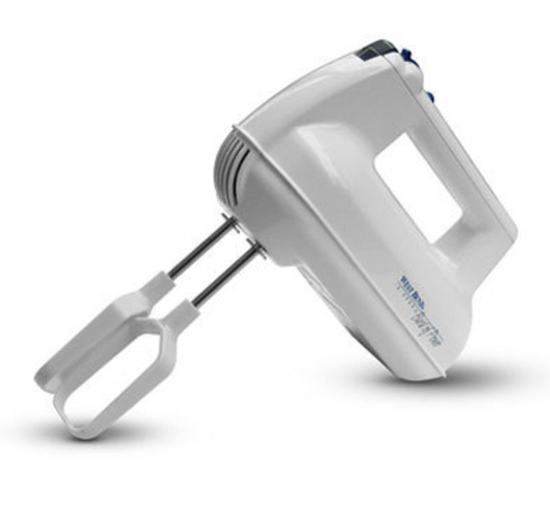 Three quarters front view of the West Bend Hand Mixer with beaters attached