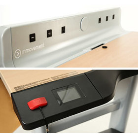 Detail view of InMovement's charging ports and emergency stop