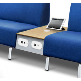 Modular power bridge between two chairs with an iPad on top