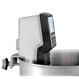 Side view of the PolyScience: Sous Vide Professional showing the clamp that holds it to the lip of a container