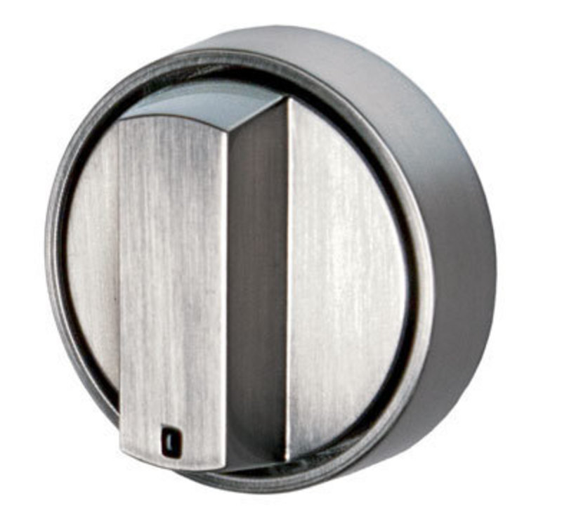 Close up view of a brushed stainless steel control knob