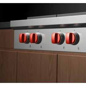 Close up view of the control knobs for the sealed burner range