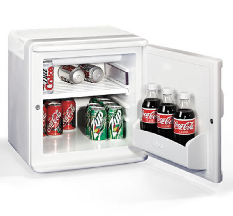 Three quarters front view of the small sized refrigerator with the door open with beverages inside